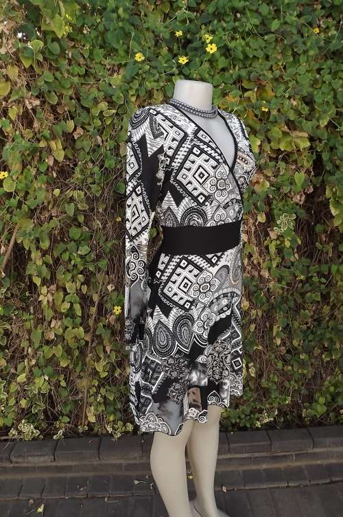 Beautiful bohemian print dress in black with white and grey.Size 34/10.Cross over front.