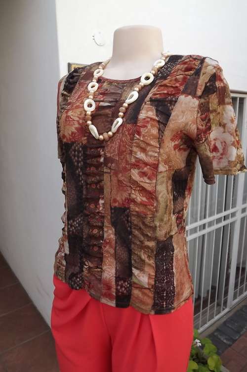Easy to wear pull over autumn colour polyester/nylon stretch top.With bo-ho patterns