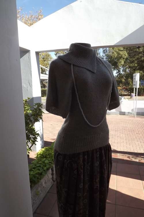 IDENTITY short sleeve grey acrylic knit top with open sided poloneck collar.Good condition