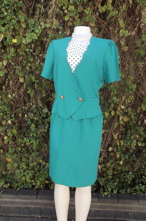 Classic jade colour dress for smart sear.Size 36/12 by LOVE RICH.Fully lined skirt with front zip