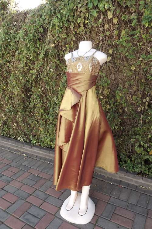 Glamorous gold colour long evening dress by ROSA FASHION size 32/8.Adjustable shoulder straps