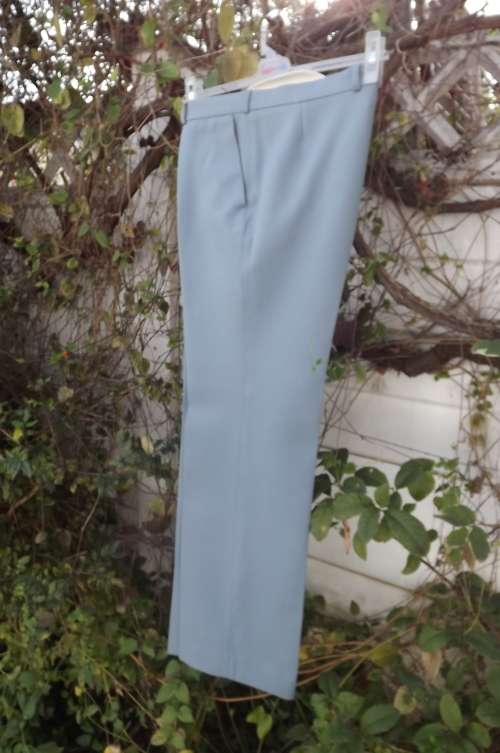 Vintage men's steele blue polyester pants by SERVUS in size 34.Excellent condition.