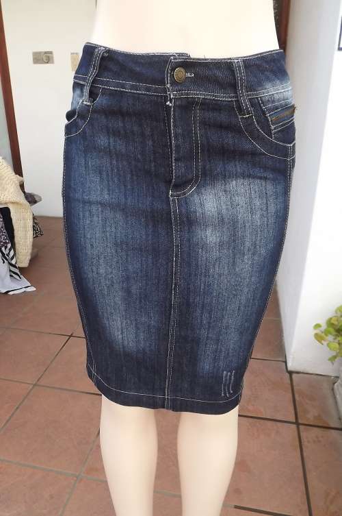 Blue denim skirt in pencil style.Pockets front and back.Slit at back.Size 30/6.By DAN LILAI fashion