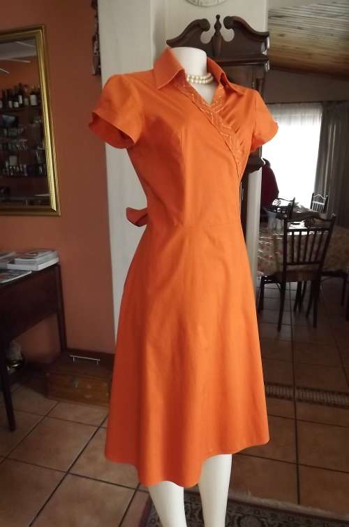 Here comes summer! Stunning  orange wrap around dress size 38/14 by KELSO.New condition