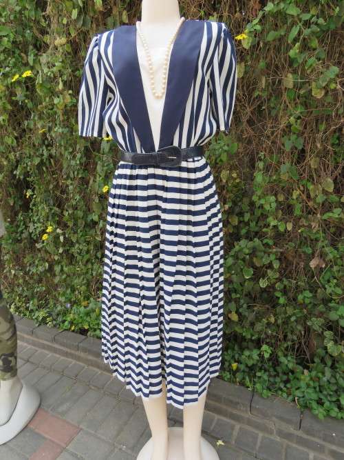 Navy and white striped dress by WOOLWORTHS in size 36/12 from the 80's with permanent knife pleated