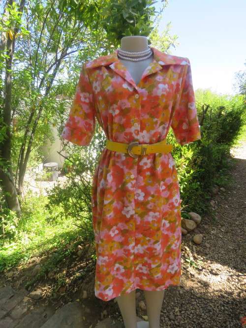 Vintage crimplene shift dress in cheerful orange,pink and green floral pattern.Size 40/16