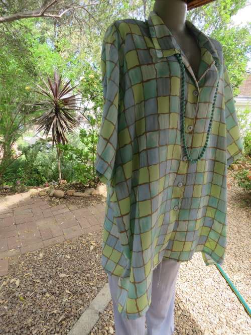 Short sleeve JUDY'S PRIDE button down top in blue and green small colour blocks.Size 54/30