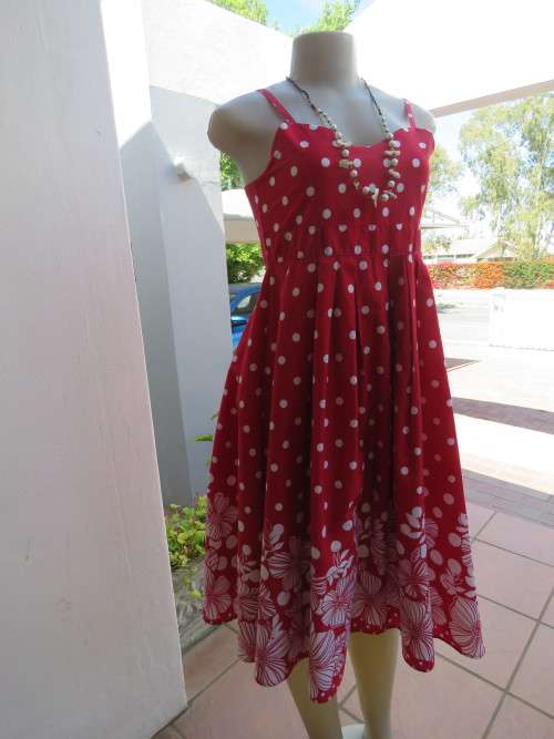Fully lined red and white polka dot strappy dress with floral border.Size 30/6 by ALL DRESSED UP