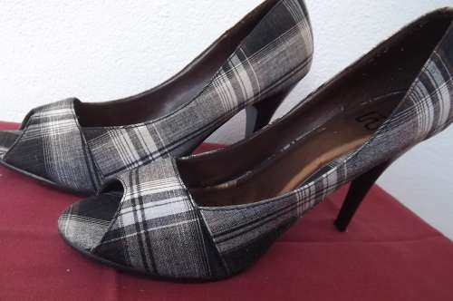 Stylish high heel black and white check open toe shoes by RT in size 6.Only used twice.As new