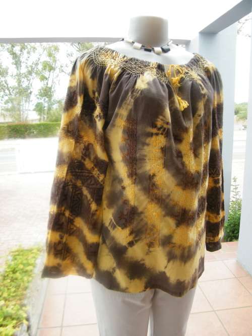 tie dye top in brown and yellow with embroidery.Size 36/12.Rounded drawstring neckline.