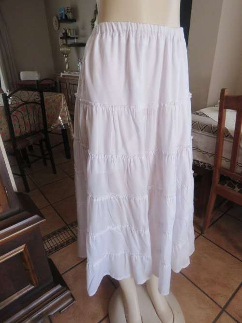 Ankle length white tiered skirt size 34/10 by SIRARNA partly lined.Cool cotton fabric.Good condition