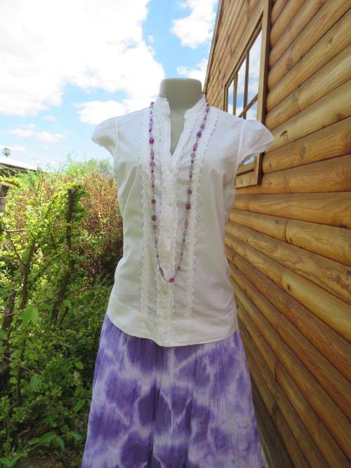 White pure cotton size 36/12 button down blouse by WOOLWORTHS.High collar and v front.