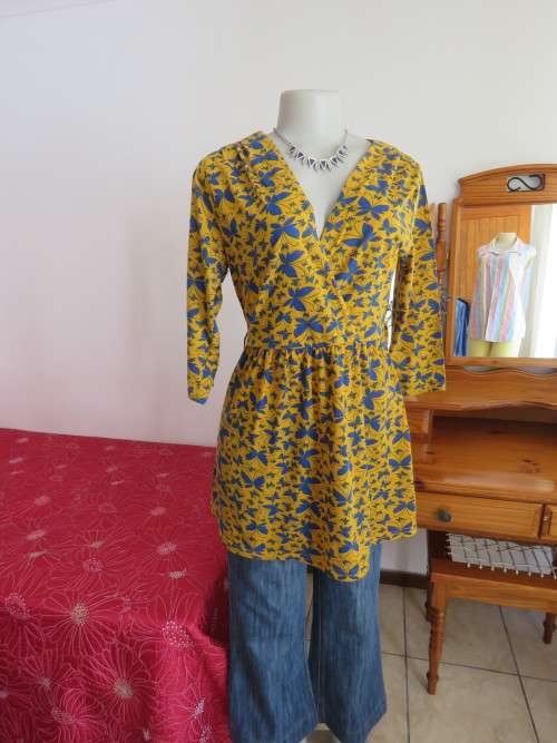 Beautiful mustard colour long top of short mini dress.Size 34/10 by NETWORK with blue butterflies