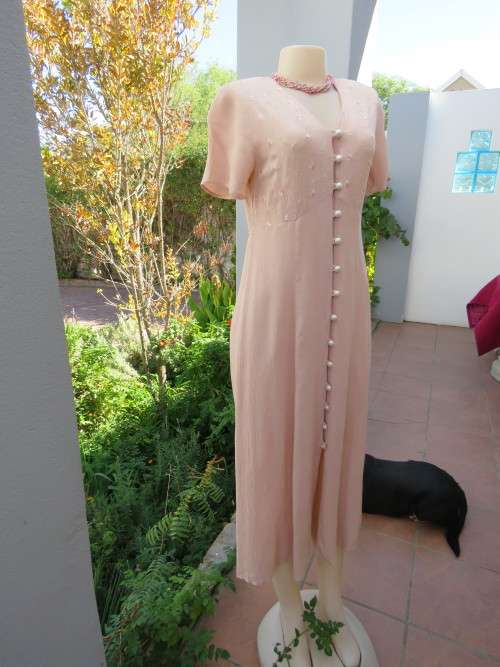 Dirty pink button down dress by TOPICS in size 32/8.Empire waist with pretty floral embroidery.