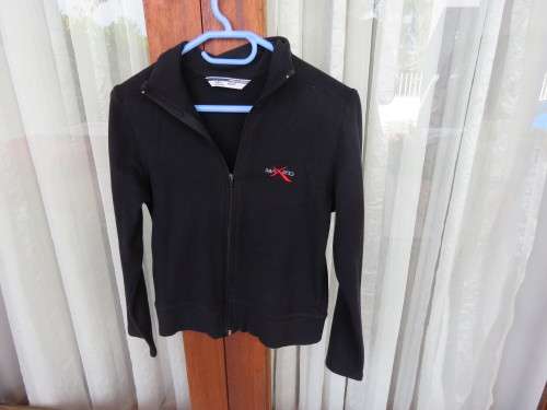 Black long sleeve zip-up stretched cotton top in size 32/8 with high collar. By MAXED. As new