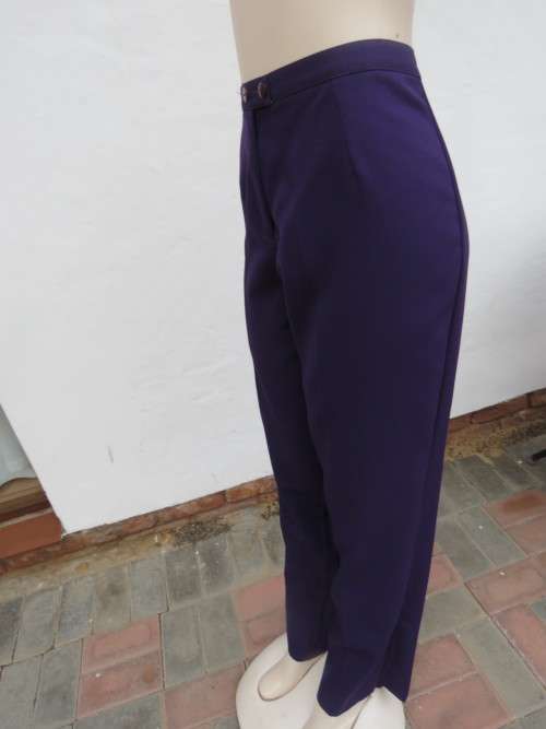 Dark purple classic 100% polyester pants by DIANELLO in size 40/16.No pockets.As new.