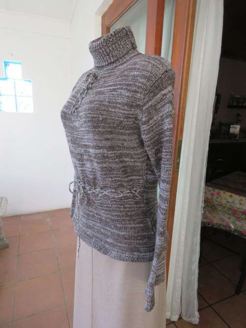 Polo Neck knitted cardigan in brown and white mottled in size 36/12.Good condition.