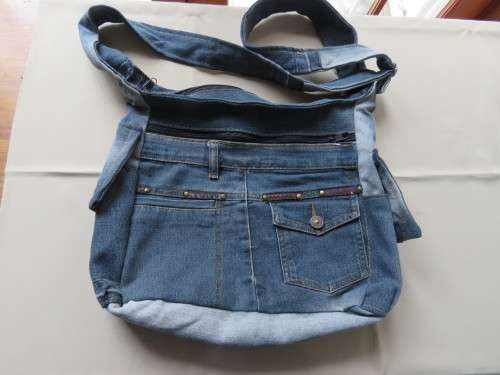 Chic and fashionable denim sling bag,made from old pair of jeans.Size 37x32cm.New item.