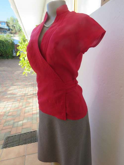 Stunning cherry red cross over capped sleeve blouse by TRUWORTHS.Size 32/8.New condition.