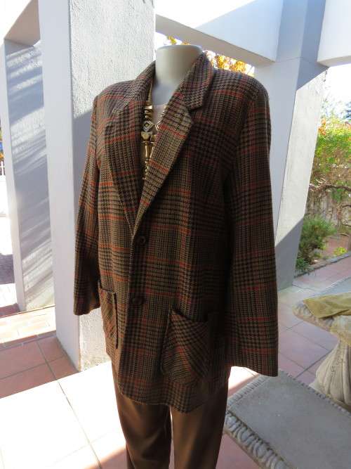 Dark beige,navy and green check blazer by ON YOUR OWN.Size 40/16.Used but in good condition.