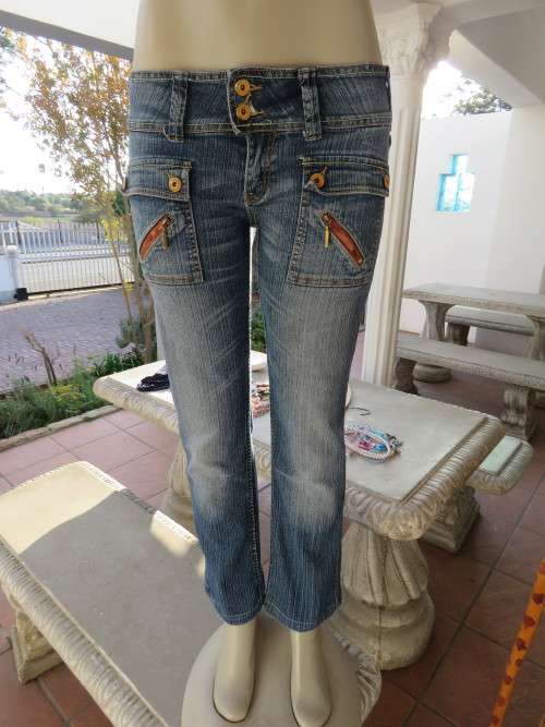 Ultra low rise 'LEGIT' jeans in poly cotton stretch denim.Size 34/10.Skinny legs.Good condition.