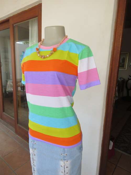 Colourful T-shirt in wide horizontal lines.lines. Size 30/6.In poly cotton.New item.