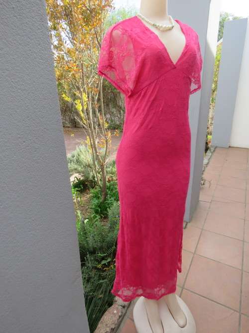 Maxi bright pink acrylic stretch lace evening dress by `DRAMA QUEEN`.Size 34/10 .New item.