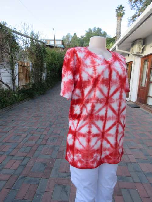 Get noticed in this tie-dyed short sleeve t-shirt.Size 36/12.Made in Thailand.New item.