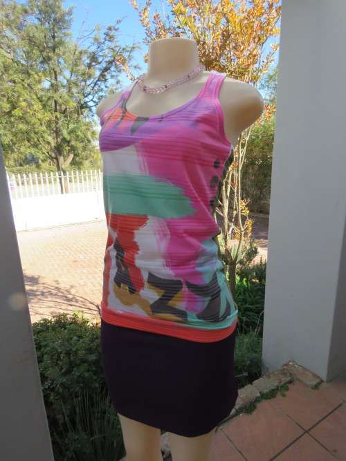 Sexy new vest style top in light brown with colourful `JAZZ` front.By `MAXTEEN` in 32/8.New item.