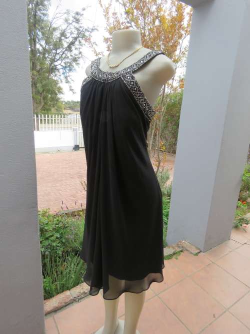 Glamorous loose black 'SCARLETT NITE' dress for evening in size 38/14.New condition.