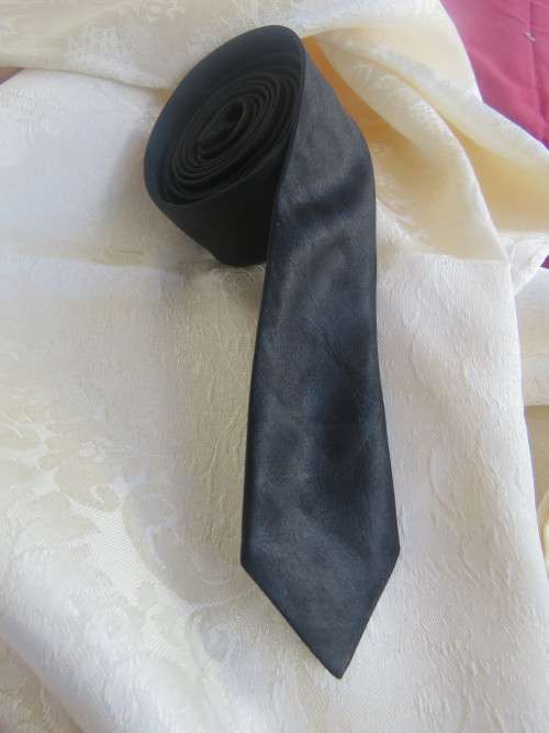 Mens black skinny necktie in silky polyester to wear with your dinner suite.Width 4cm As new