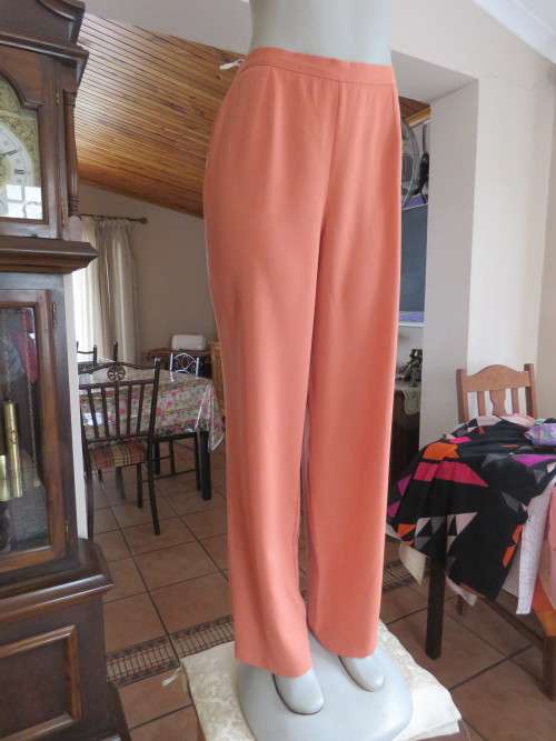 Brick colour comfortable summer pants by 'WOOLWORTHS' in 38/14.Used but still in fine condition.