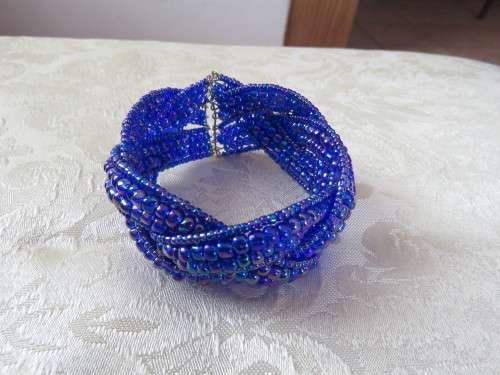 Blue and purple braided cuff bead bracelet.Three bands with tiny glimmer beads.New item.