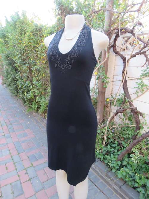 Top of the line black dress by 'LES POSSEDES' IN 32/8.Made in France.In polyamide stretch.New cond.