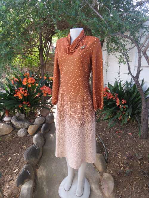Amazing dress in golden brown with cream polka dots by 'PRINCESS' in 36/12.Very good condition.