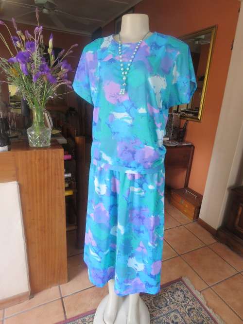 Tastefully printed 2 piece skirt outfit by 'LADY HARRINGTON' in 40/16.100% polyester.As new.