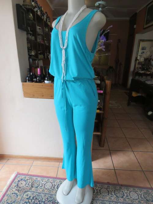 Fashionable sleeveless getaway green jumpsuit in size 34/10 by 'AERIE'.Never used.As new.