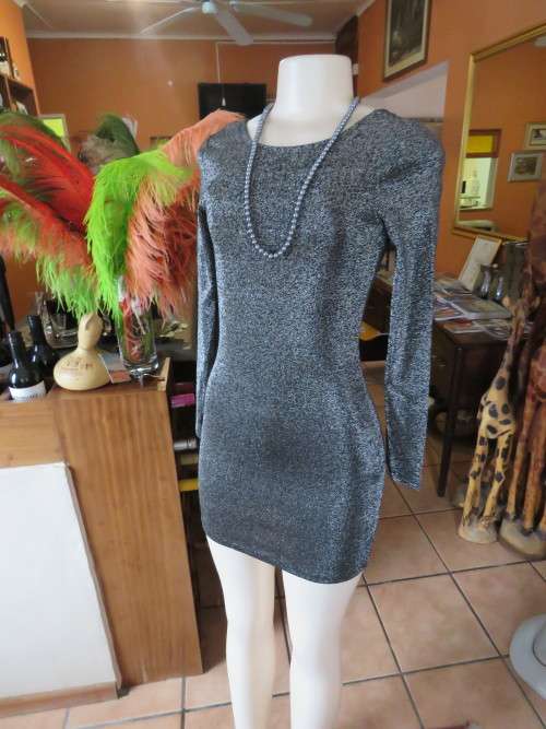 Black and silver glitter clubwear bodycon mini dress in size 32/8.Made in Cambodia.New dress.