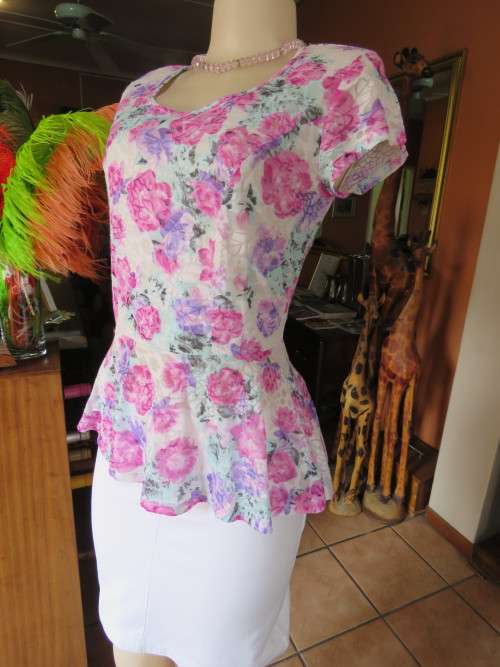 Supersoft peplum slip over 'EXACT' in 36/12 top in opaque polyester/rayon fabric.New condition.