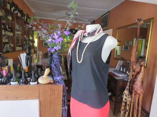 Black sheer polyester sleeveless top in cami style in size 34/10 with small diamond design.Good cond