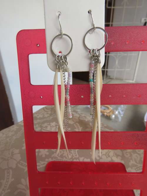 Pair of dangling fashion earrings.A must to wear with your dainty summer dress.New item.