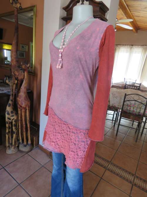 Bo-ho chic long top by 'KHEERA' in size 34/10 with wide low V-neckline.New condition.