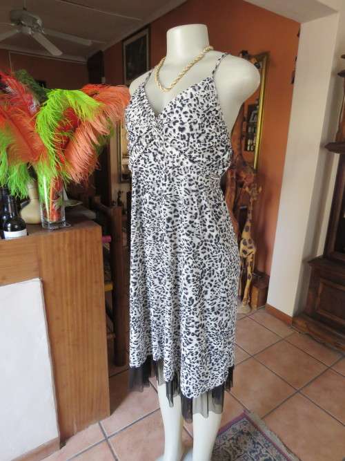 Cool sexy animal print dress in black/white sheer polyester/nylon.Size 42/18.Good condition.