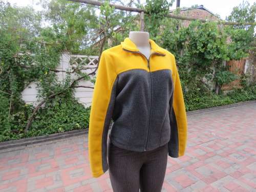 Warm grey zipped up polyester fleece top with yellow long sleeves.By 'WOOLWORTHS' in 36/12.As new.