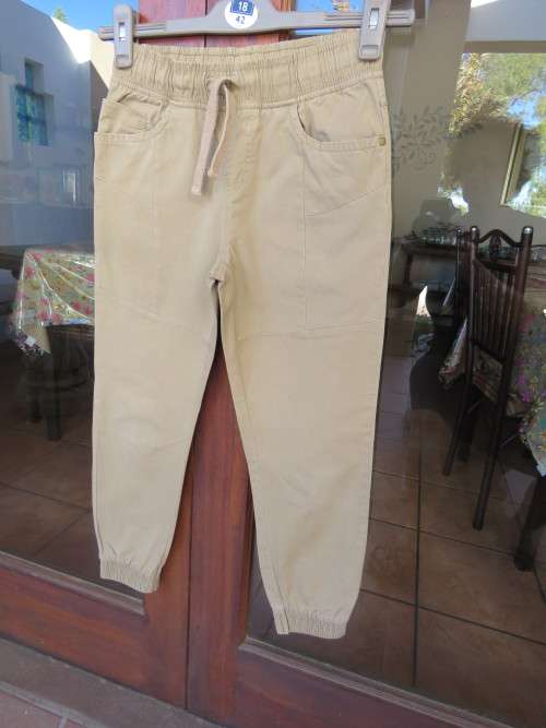 Khaki colour long pants for boy of 9-10 yr old.By 'WOOLWORTHS' in 100% cotton.New condition.