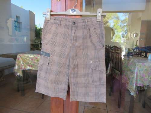 Chic light brown check shorts for 9-10 yr old boy.By 'JBR'.Pockets galore!!!Dummies at back.As new.