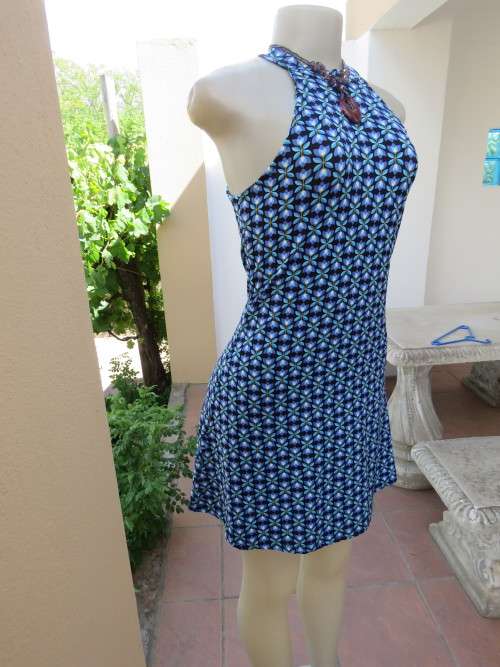Cute and sexy black dress with blue and purple graphic floral pattern.By 'RT' in size 32/8.New cond.