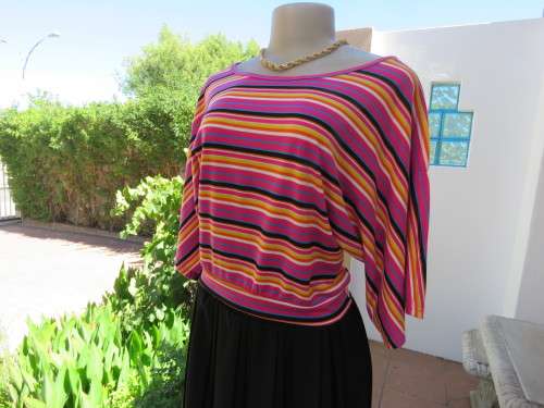Sassy horizontal striped slip over top in lively colours .By DESTINY in size 32/8. As new
