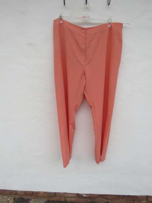 Ladies peach colour 'ANNA PIA' pants in size 48/24.Elasticated at back waist sides.New item.