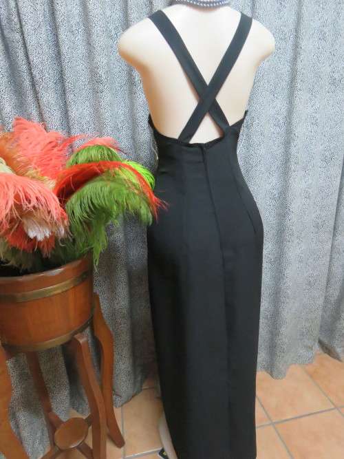 Go formal with this princess style long black evening dress.Size 38 14 by FOSCHINI.As new